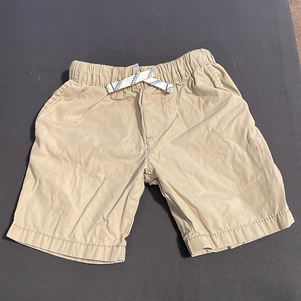 Shorts set!! Carter’s boys 4T. You get both pairs. Navy blue & Tan.